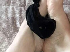 gretala rubs thong on sexy bare feet