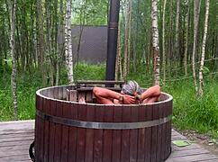 Cute blonde enjoys outdoor bath sex