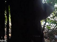 Naked Skinny Tribe Woman Crafts Bow for Hunting