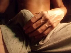 hot guy moaning while jerking his big cock in pajamas