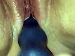Ridged Dildo Inserts Into Sloppy Wet Pussy