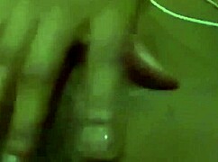 Detailed view of female masturbation with focus on her actions