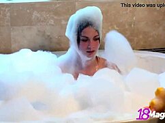 Young petite Emi Clear plays with pink pussy in shower compilation.