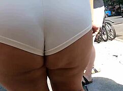 MILF Flashes Ass In See-Through Shorts Outdoors