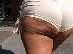 MILF Flashes Ass In See-Through Shorts Outdoors