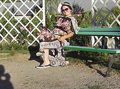 look at that hairy mature flashing her pussy in the park