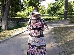 look at that hairy mature flashing her pussy in the park