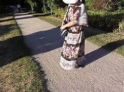 look at that hairy mature flashing her pussy in the park