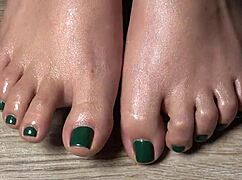 Close-Up View Of Green-Nailed Toes For Your Fetish