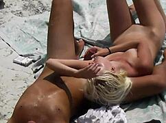 Slim Blonde Masturbates While Her Boyfriend Watches At The Nudist Beach