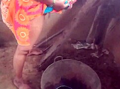 Housewife shows her big boobs in the village house