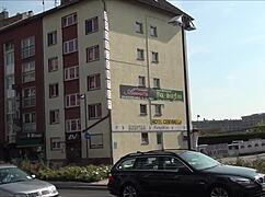 a tourist explores outside eros center amor in frankfurt germany, european adventure.