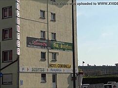 a tourist explores outside eros center amor in frankfurt germany, european adventure.