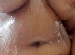 Rich Milf Bathes with Big Tits