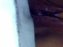 the woman masturbates with sextoy to orgasm and creampie