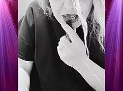 Intensely shaking booty in boyfriend's clothes during dominant dance.