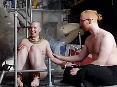 The slave girl, blindfolded and bound, rides the steel pony for domination and multiple orgasms