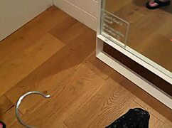 kiwi milf tries on clothes at the mall with a drink