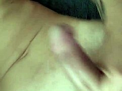 He jerks off on the sofa, lost in solo pleasure