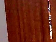 kiwi milf tries on clothes at the mall with a drink