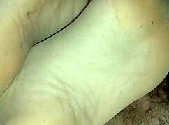 Homemade sensual footjob in tan stockings teasing toes