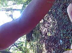 Brunette explores nature in the woods