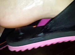 Luh demonstrates detailed foot care techniques in professional setting