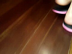 Luh demonstrates detailed foot care techniques in professional setting