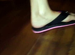 Luh demonstrates detailed foot care techniques in professional setting