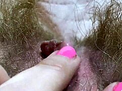 Intense closeup of huge clitoris rubbing leads to orgasm