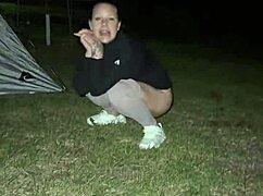 I flashed my wet pussy outdoors with a big dick by the campfire.