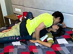 A female friend joins the group for a study session at home