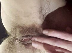 A teacher takes a break to masturbate her hairy wet pussy.