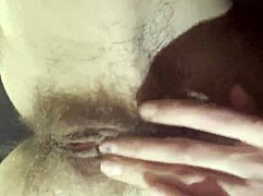 A teacher takes a break to masturbate her hairy wet pussy.