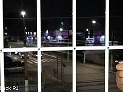 Couple enjoys passionate sex at the apartment window, teasing onlookers with lingerie and blowjob