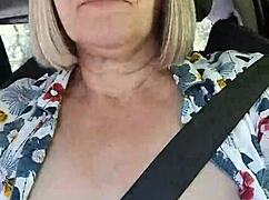 selfie with exposed tits in the car