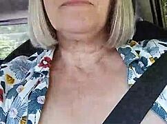 selfie with exposed tits in the car