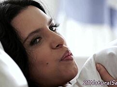 bigtits model poses on all fours