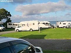 filthy kiwi mature milf pisses on the ground at the campground while campers are around