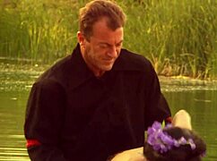 A beautiful girl with small 18+ tits rode a strong man on a boat