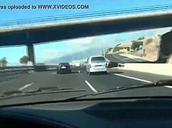 Young adult has fun in the car with toys