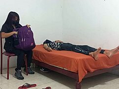 The naughty nurse boldly gropes her big juicy tits while treating the patient