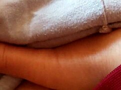 MILF Touches Herself in Pajamas, Reaching Orgasm in the Bedroom.