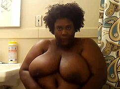 Indiana woman goddess indulges in self-masturbation, playing with her big tits and mature body.