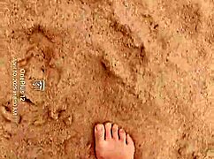 bare feet play in the sand