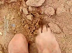 bare feet play in the sand