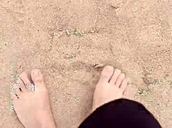 bare feet play in the sand