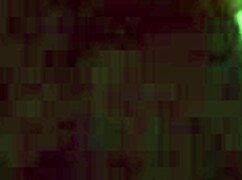 she's pleasuring herself with a huge dildo insertion at home.