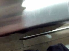 she gets naked and masturbates in a public toilet, feeling exposed