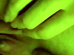 Fingering her tight shaved pussy until it's wet